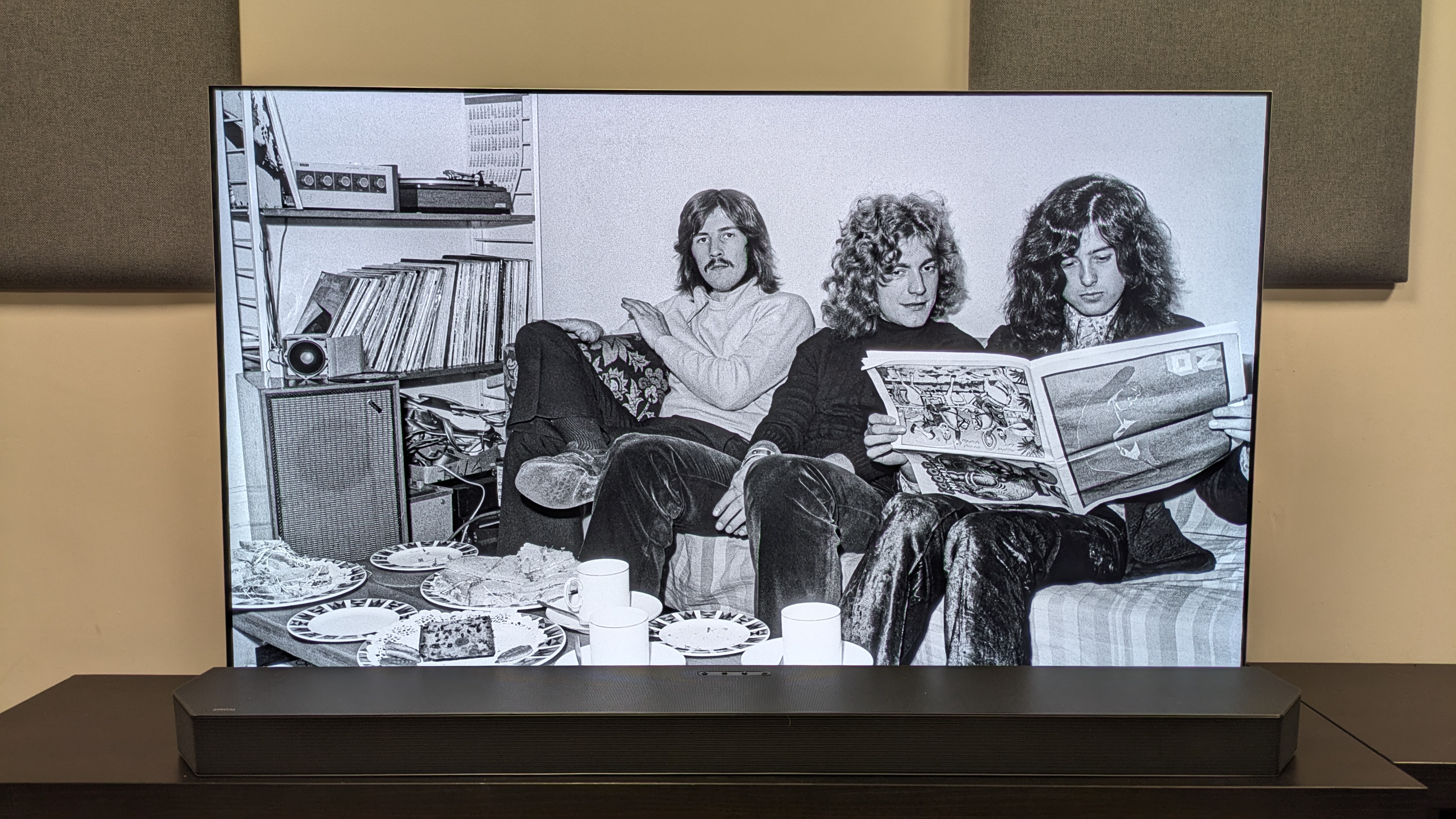 Becoming Led Zeppelin 4K Blu-ray on LG G5 showing Led Zeppelin band photo with Robert Plant, John Bonham and Jimmy Page on a sofa