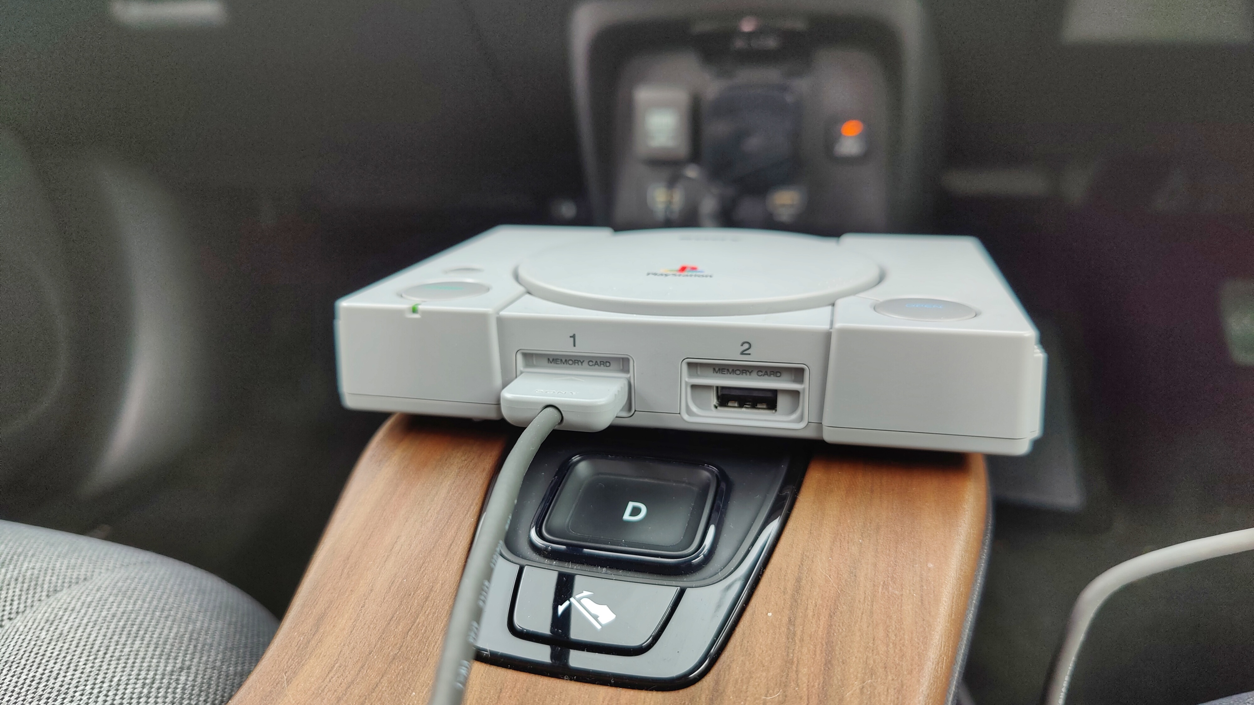 Close-up of the PlayStation Classic in the Honda e