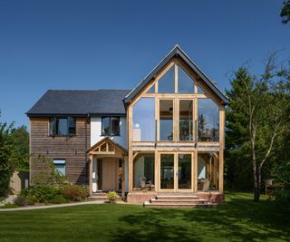 Double storey oak frame extension with vaulted second storey