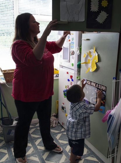 Marie and her son, Save the Children campaign