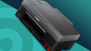 A canon printer against a two-tone TechRadar background