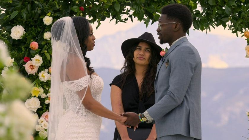 Edmond and Kalybriah at the altar in Love is Blind. 
