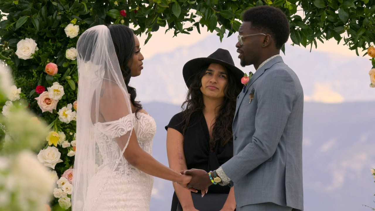 Edmond and Kalybriah at the altar in Love is Blind. 