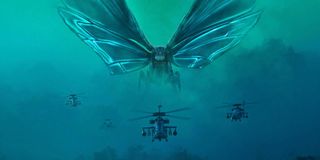 Morthra flying with helicopters in Godzilla: King of the Monsters poster