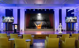 The company’s executive briefing center, which is used to host livestreamed events, features stage lighting, video presentation equipment from Blackmagic, microphones, and a large Christie LED wall.