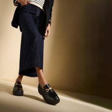 Model wearing FitFlop loafers