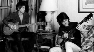 Ron Wood & Keith Richards, playing guitars in hotel room