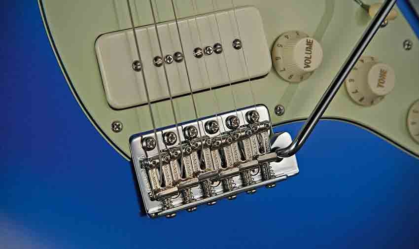 The P-90 is stacked, and turning the Vari-coil down fades it to a single coil
