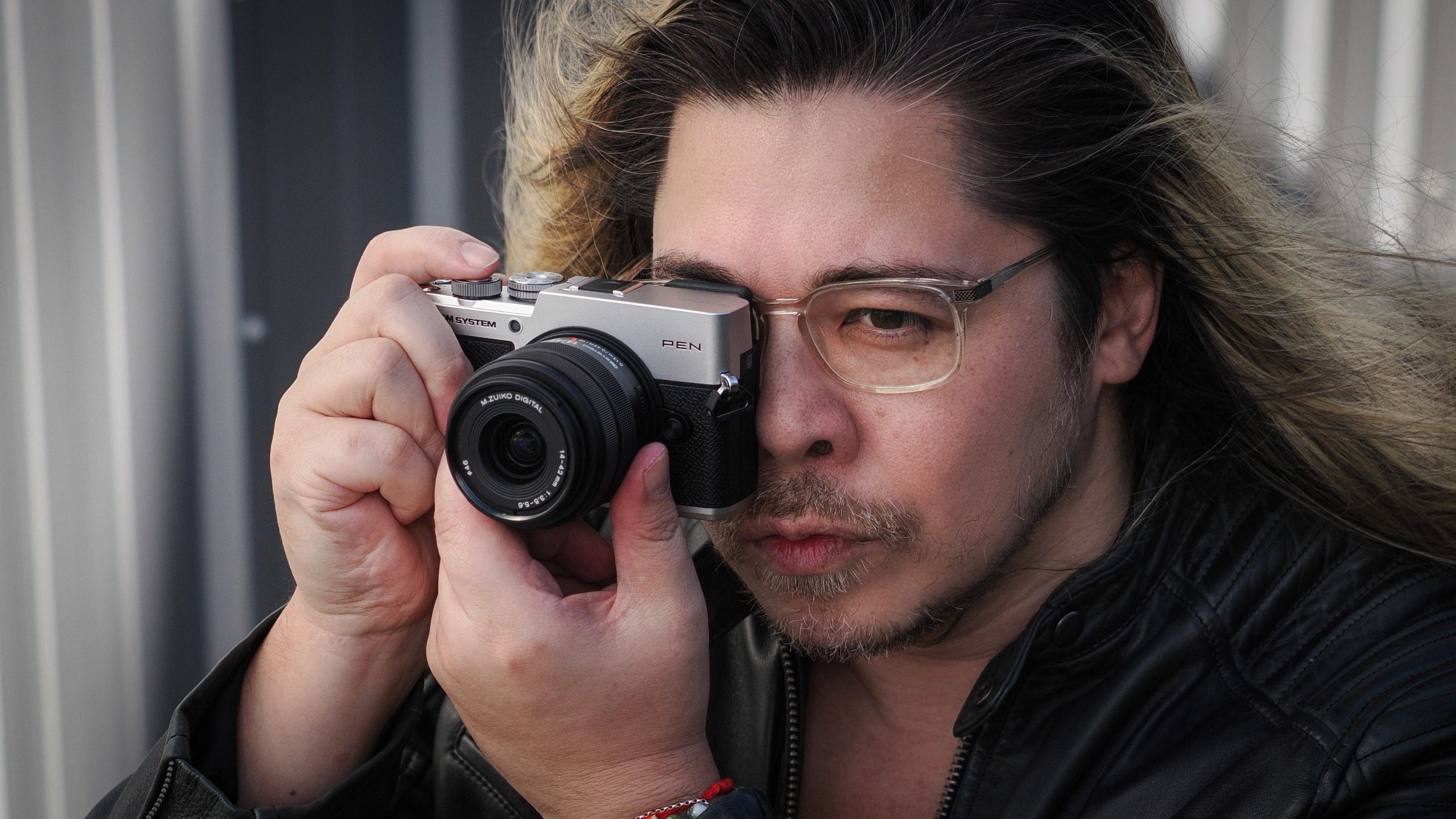 James Artaius shooting with the OM System PEN and the OM System M.Zuiko 14-42mm f/3.5-5.6 III in an urban setting