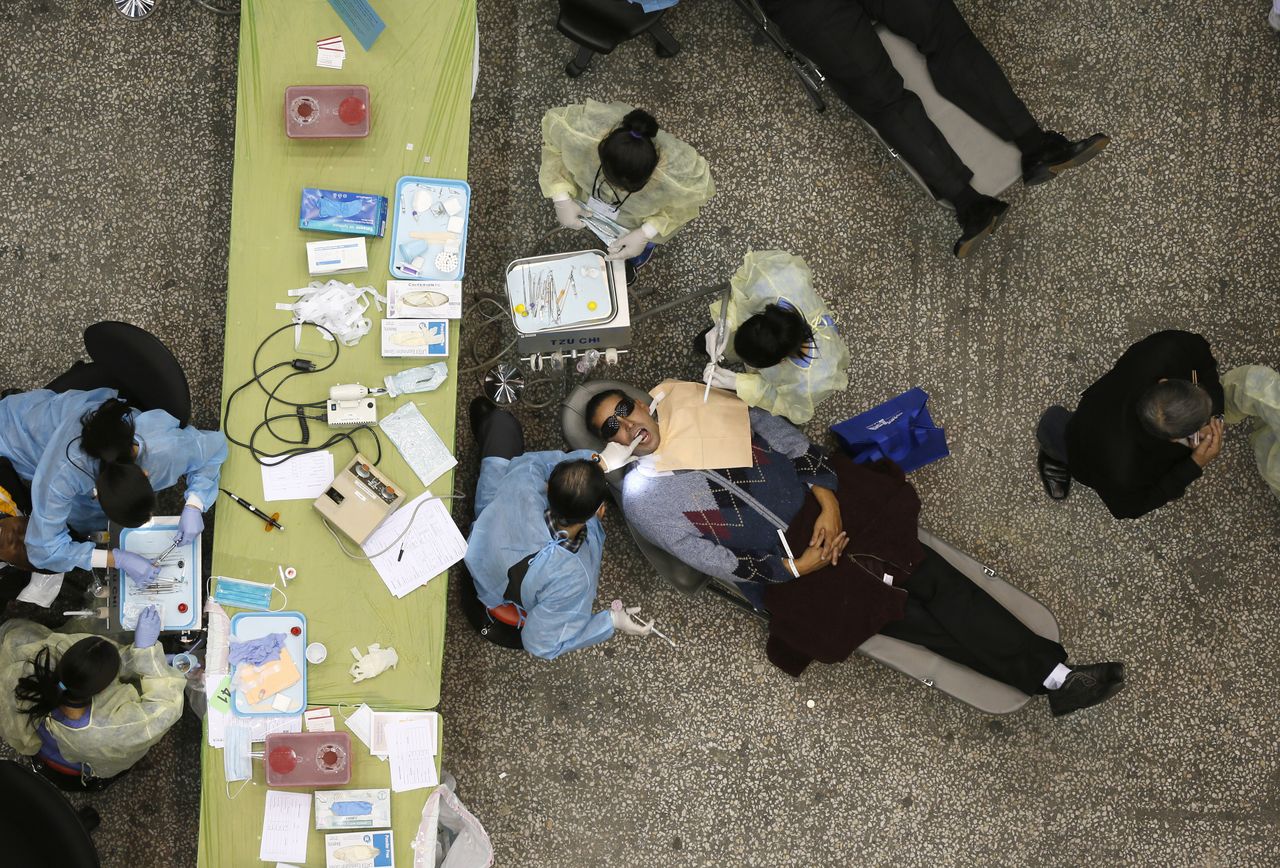 People receive free dental care in Oakland.