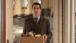Ramon Rodriguez as Will Trent carrying a box in Season 2