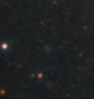 The cosmic neighborhood around the open star cluster IC 4651 is filled with stars of all types. This shows a wide-field view around the cluster using images from the Digitized Sky Survey 2. The bright star on the the left is Alpha Arae, one of the brightest stars in the constellation of Ara (The Altar).