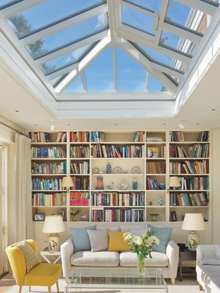 bookcase in a modern sunroom conservatory and roof lantern