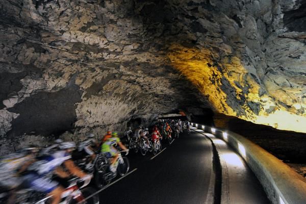The peloton negotiates a tunnel during stage 15 of the Tour de France.