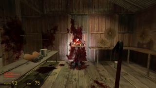 A zombie sawed in half, letting the player know that they can dispatch of the enemy in this way.