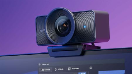 Elgato Facecam 4K on top of a monitor with Camera hub displayed on the screen. 