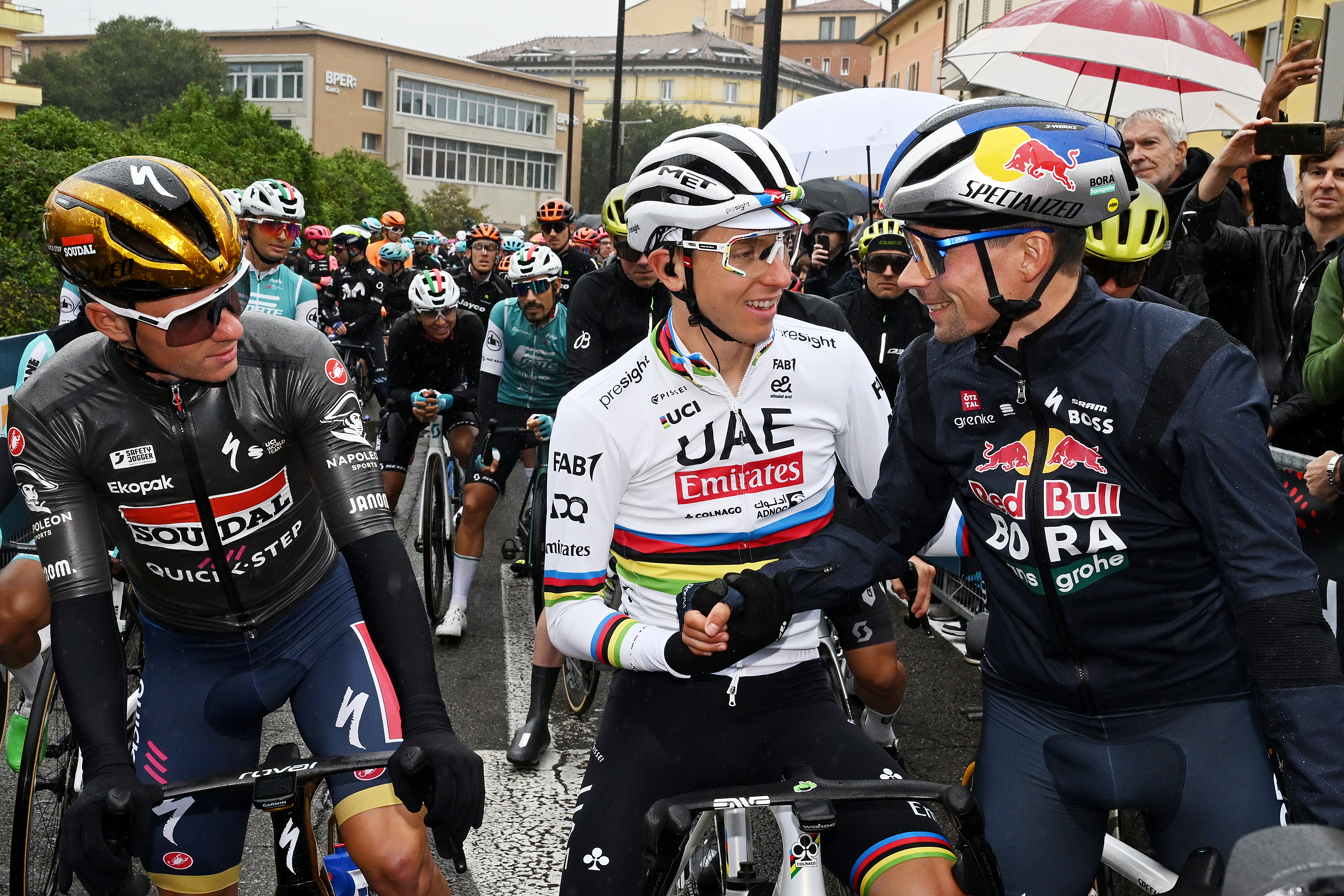 VIGNOLA, ITALY - OCTOBER 05: (L-R) Remco Evenepoel of Belgium and Team Soudal Quick-Step, Tadej Pogacar of Slovenia and Team UAE Team Emirates and Primoz Roglic of Slovenia and Team Red Bull - BORA - Hansgrohe prior to the 107th Giro dell'Emilia 2024 a 215.3km one day race from Vignola to Bologna - San Luca 267m on October 05, 2024 in Vignola, Italy. (Photo by Dario Belingheri/Getty Images)