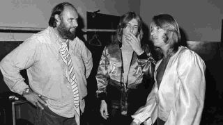 Manager Peter Grant backstage with Bad Company’s Mick Ralphs and Simon Kirke