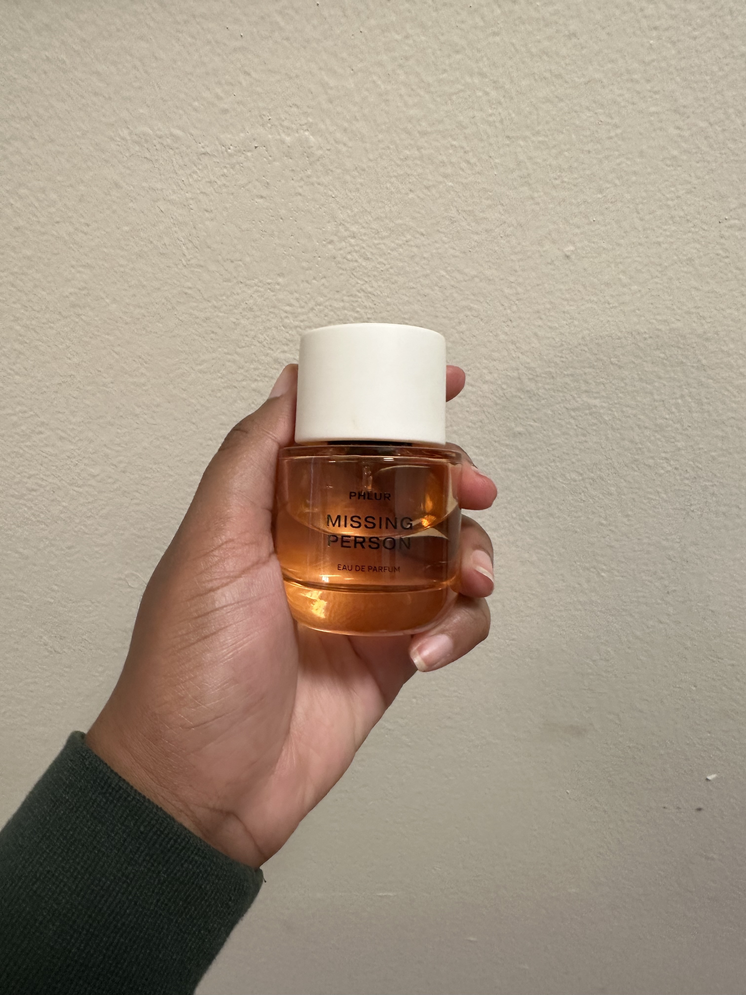 Ariel Baker testing Missing Person perfume.