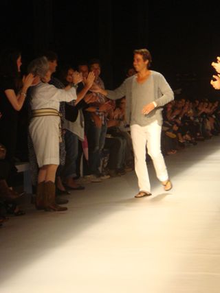 Designer Maxime Perelmuter greets the audience