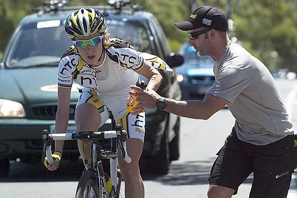 Germany's Judith Arndt takes on-board a drink
