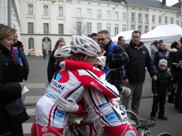 Red Sun riders embrace each other at the finish