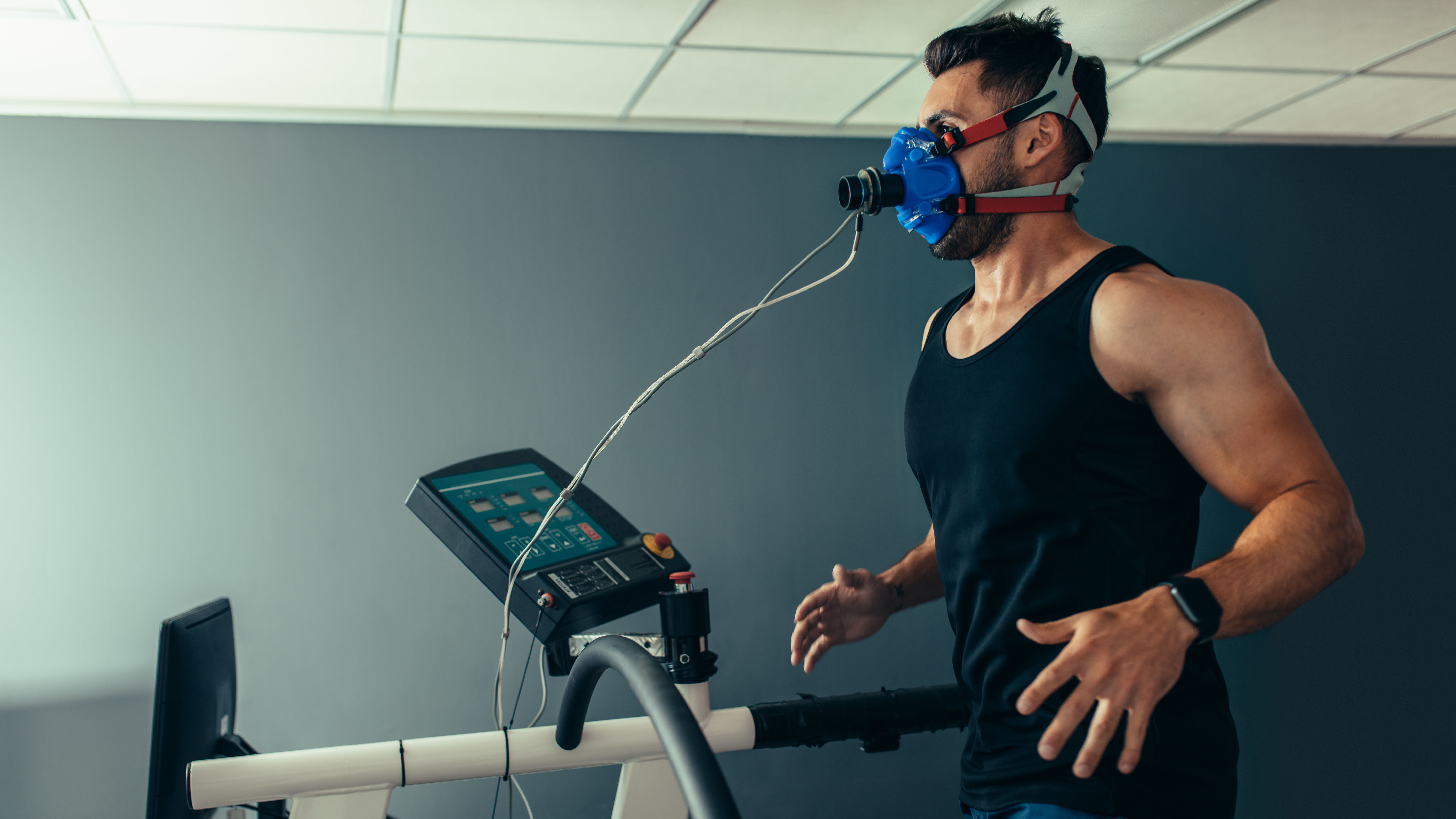 Man having VO2 Max tested on treadmill