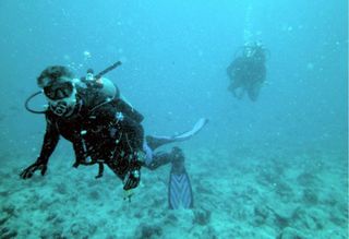 Diving for wreckage, amelia earhart project