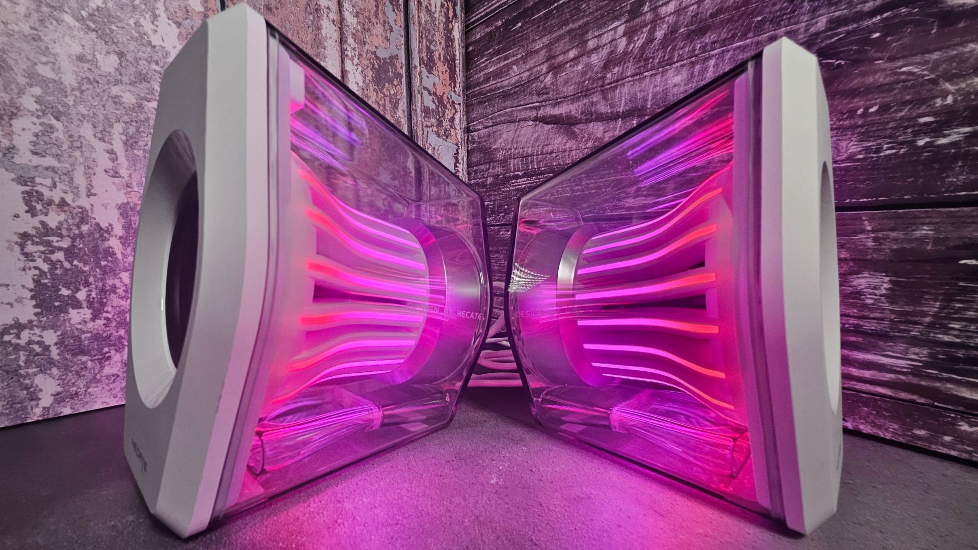 The RGB lighting arrays on the Edifier G2000 Pro speakers showing pink lighting