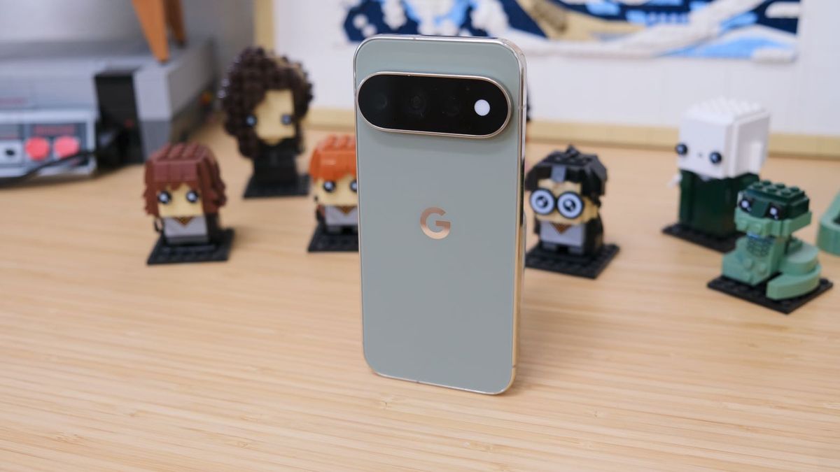 The Google Pixel 11 Pro resting on a wooden table
