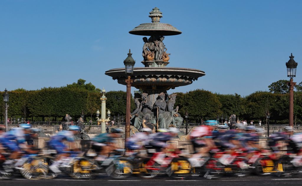 The pack of riders cycles on Place de la Concorde during the 21st and final stage of the 109th edition of the Tour de France cycling race 1156 km between La Defense Arena in Nanterre outside Paris and the ChampsElysees in Paris France on July 24 2022 Photo by Thomas SAMSON AFP Photo by THOMAS SAMSONAFP via Getty Images