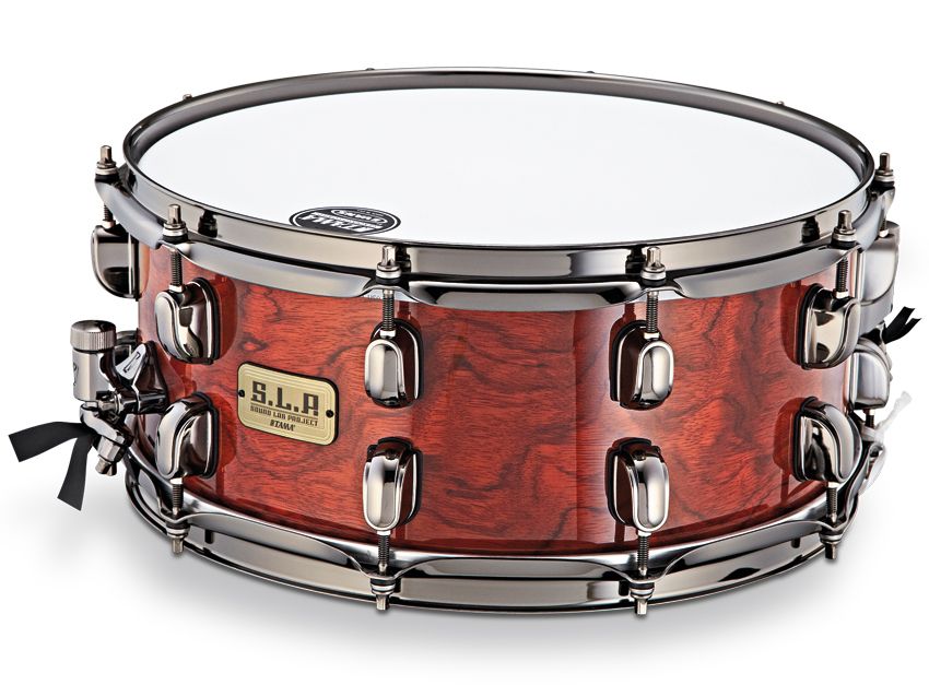 The SLP G-Bubinga snare features Tama's gun turret-style Starclassic lugs.