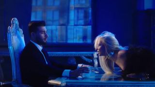 screenshot of Britney Spears and Sam Asghari in "Slumber Party" music video