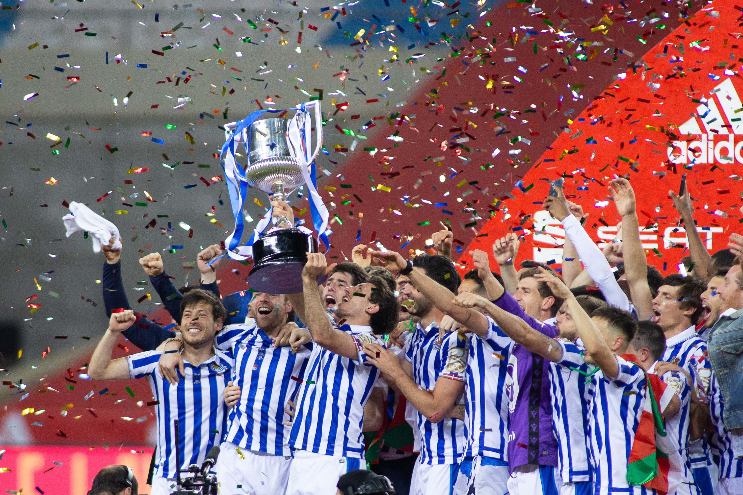 Real Sociedad players celebrate their Copa del Rey final win over Athletic Club in April 2021.