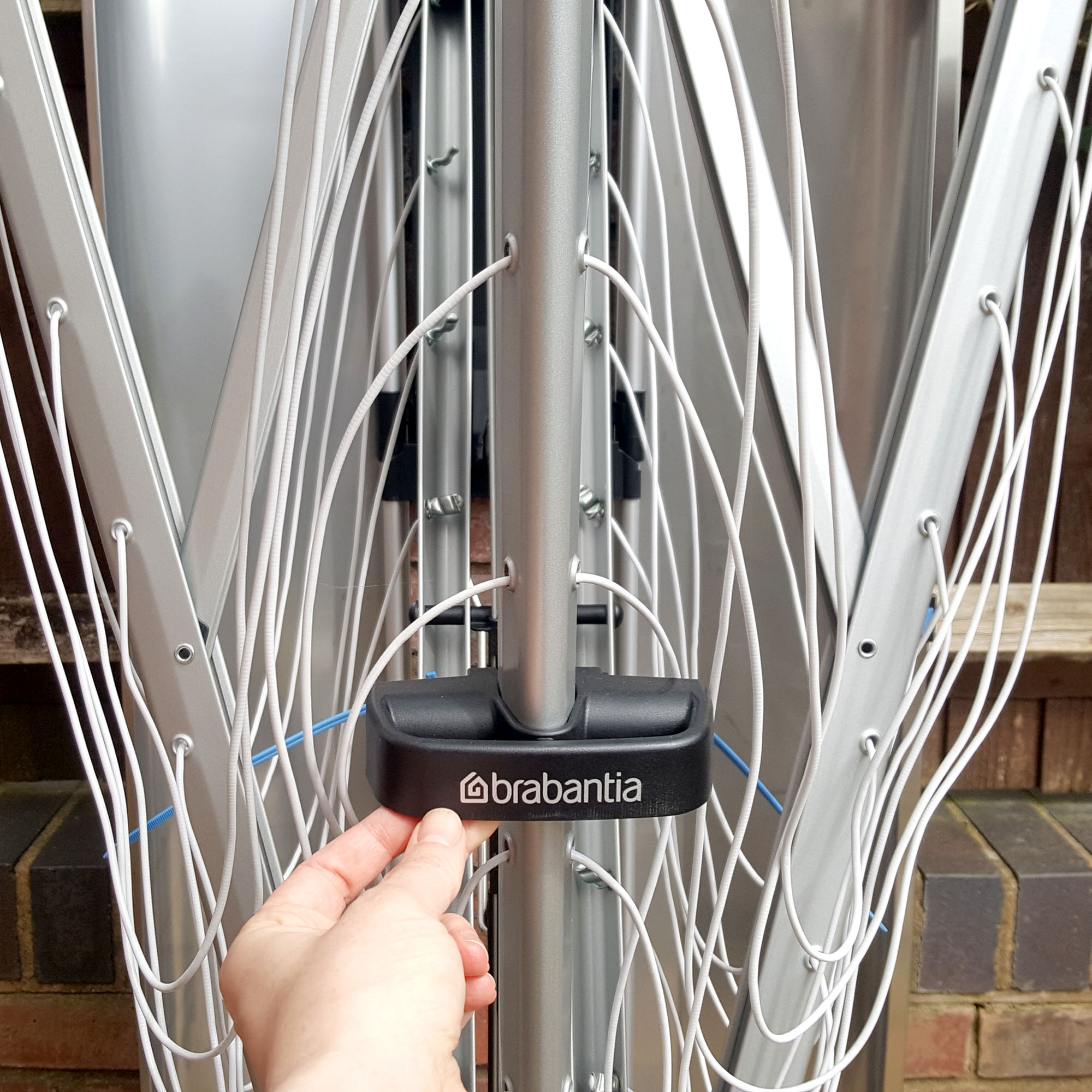 The Brabantia Wallfix Dryer mounted in a small patio