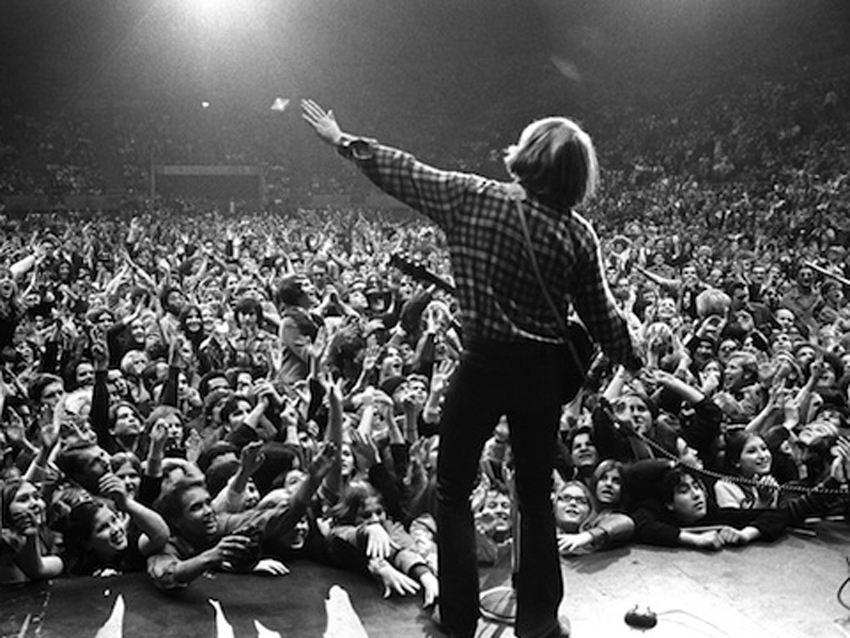 John Fogerty on stage with CCR at the Oakland Coliseum Arena, Oakland, CA, 1970