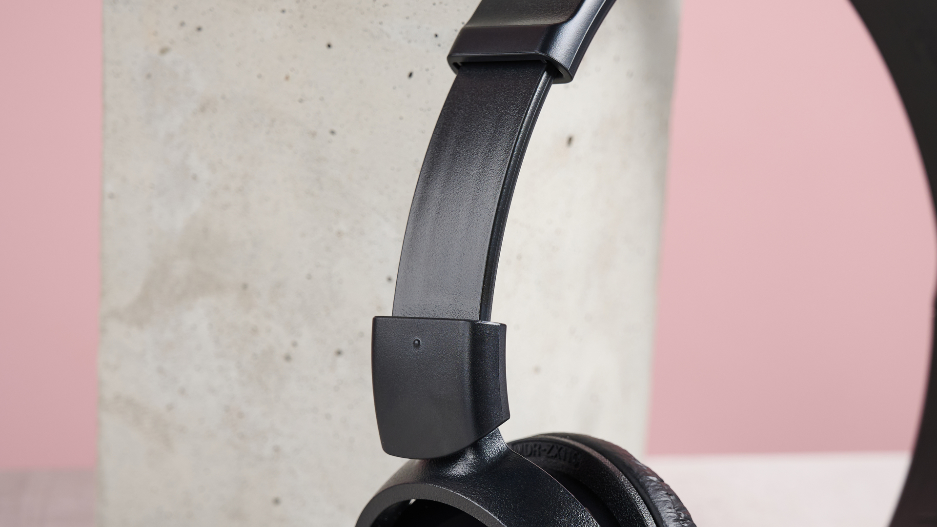 A closeup of the extendable arms of the Sony MDR-ZX110.