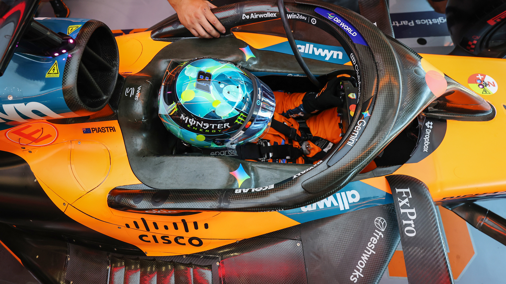 bird's eye view of race car with driver