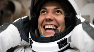 sarah gillis in a helmet and smiling