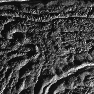 This image is the fourth skeet-shoot footprint taken during Cassini's very close flyby of Enceladus on Aug. 11, 2008. Cairo Sulcus is shown crossing the upper left portion of the image. An unnamed fracture curves around the lower right corner.