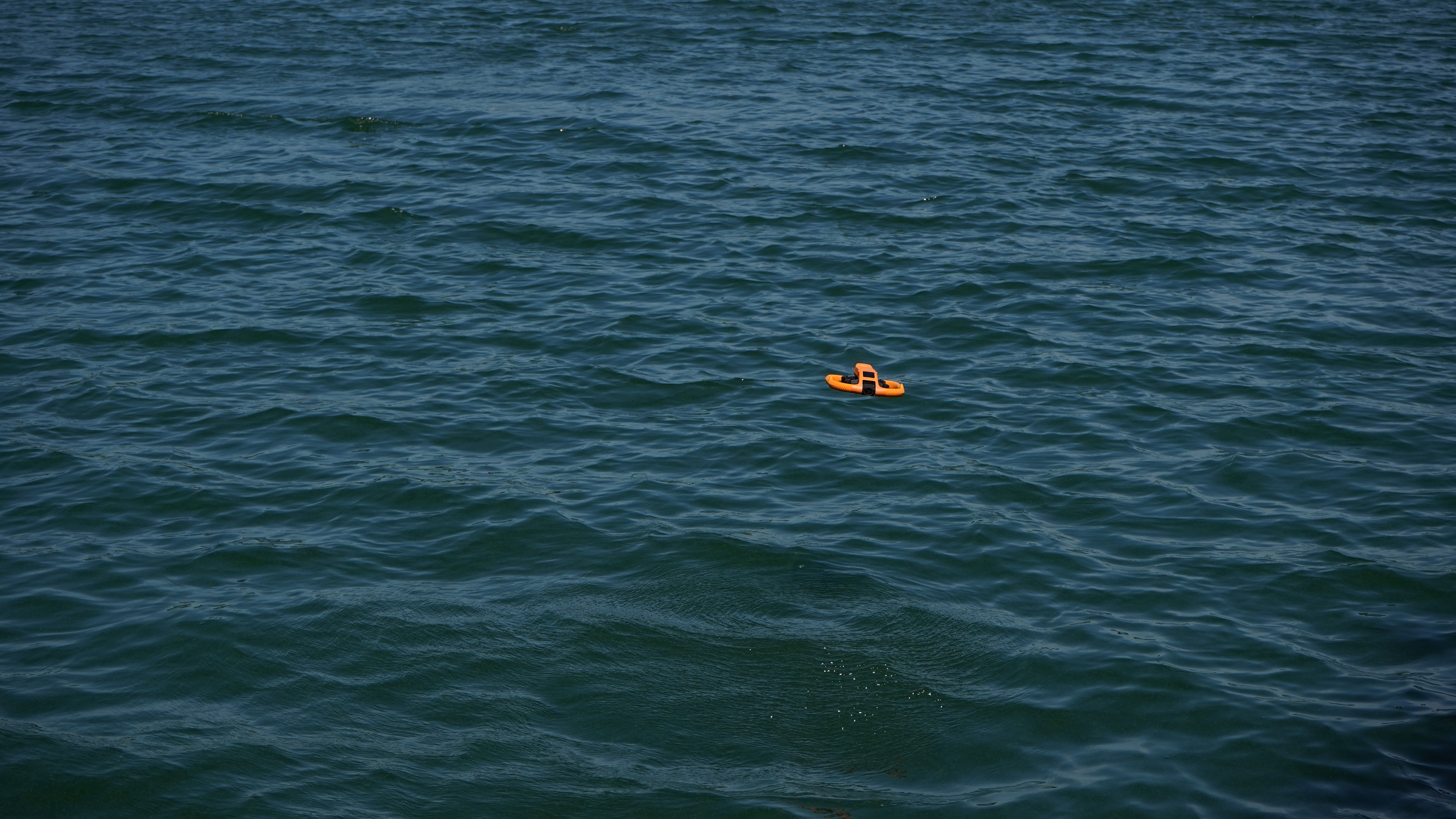 HoverAir Aqua over water