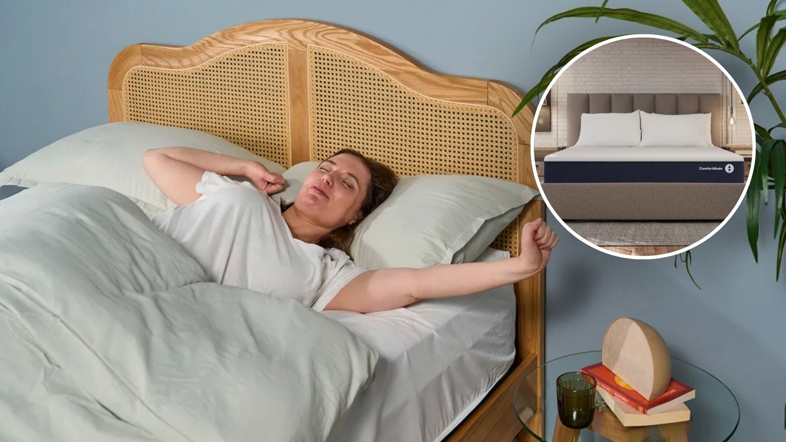 A woman waking up and stretching in bed under light green bedding with a rattan headboard. Hatch sunrise alarm clock and a glass of water sits on a glass table beside the bed. Circular inset image showing a Sleep Number smart mattress with "ComfortMode" controls.