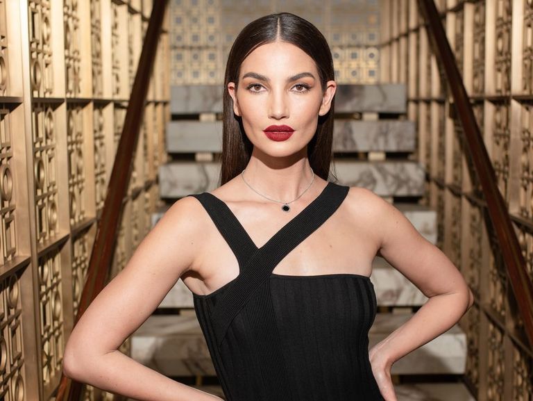 Fashion model, Clothing, Fashion, Dress, Beauty, Shoulder, Little black dress, Cocktail dress, Model, Haute couture,
