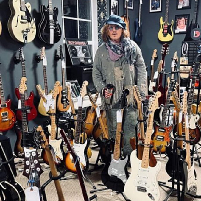 Johnny Depp with some guitars