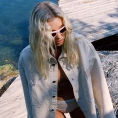 Helsa hosk in white jacket and sunglasses