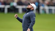 Tyrrell Hatton clenches his fist and looks up to the sky after winning the 2024 Alfred Dunhill Links Championship