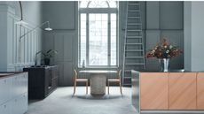 A kitchen and dining room painted blue