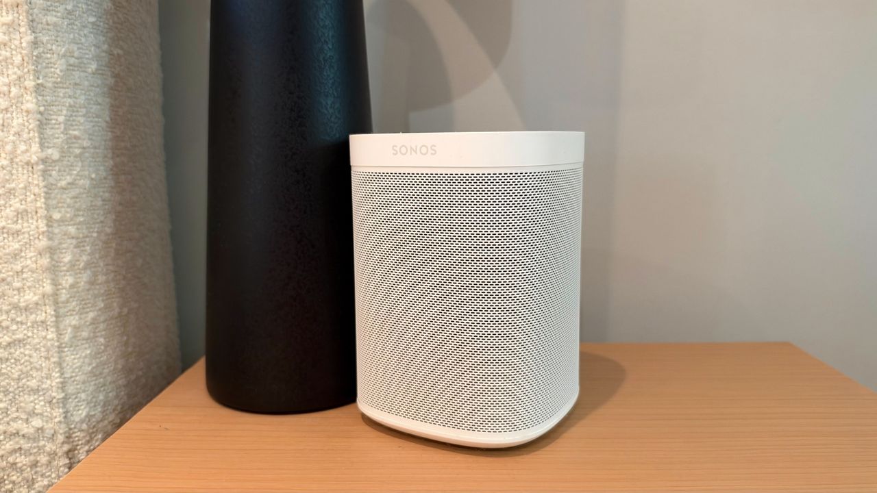 White Sonos one on a bedside table.