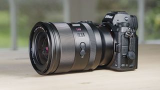 Viltrox AF 35mm F1.2 LAB Z lens for Nikon, attached to a Nikon Z6 II, on a wooden table