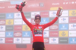 ALTU DE LANGLIRU SPAIN SEPTEMBER 13 Sepp Kuss of The United States and Team JumboVisma Red Leader Jersey celebrates at podium during the 78th Tour of Spain 2023 Stage 17 a 1244km stage from Ribadesella Ribeseya to Altu de LAngliru 1555m UCIWT on September 13 2023 in Altu de LAngliru Spain Photo by Alexander HassensteinGetty Images